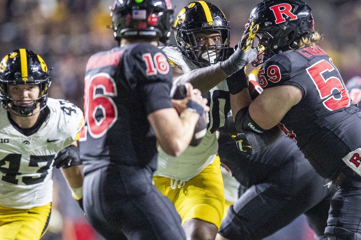 Iowa defensive end Brian Allen reaches out for Rutgers quarterback Athan Kaliakmanis during a football game between Iowa and Rutgers at SHI Stadium in Piscataway, N.J. on Sept. 19, 2025. The Hawkeyes defeated the Scarlet Knights 38-28.