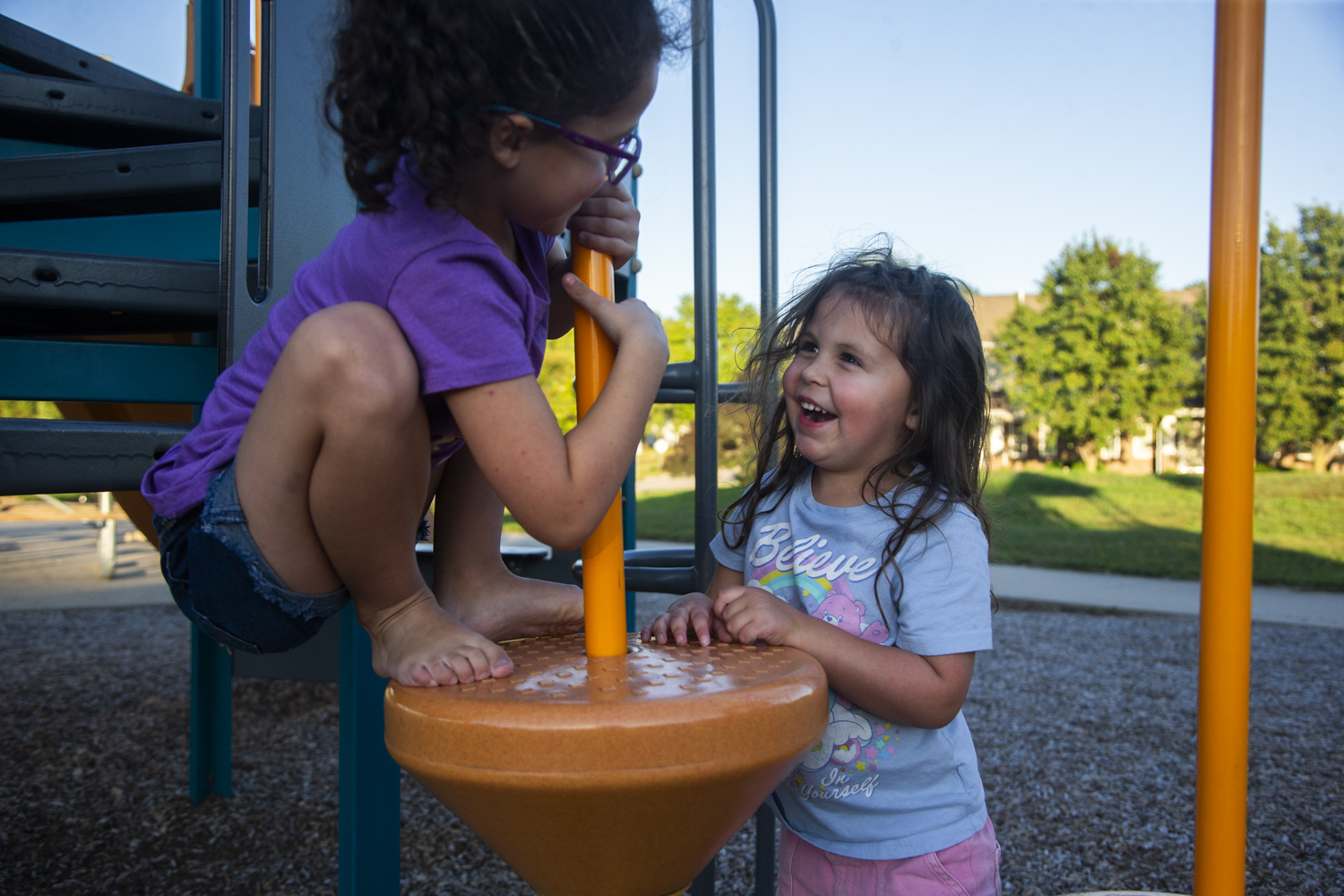 Freya McNulty, 7, and Rhiannon McNulty, 4, play on the playground at Frauenholtz-Miller Park in Iowa City on Thursday, Sept. 25, 2025. Rhiannon is asthmatic and has been hospitalized on three separate occasions for respiratory illnesses, two of which were for respiratory syncytial virus, or RSV. By the time the RSV vaccine was approved for babies under eight months old on July, 2023, Rhiannon was already too old to be eligible.