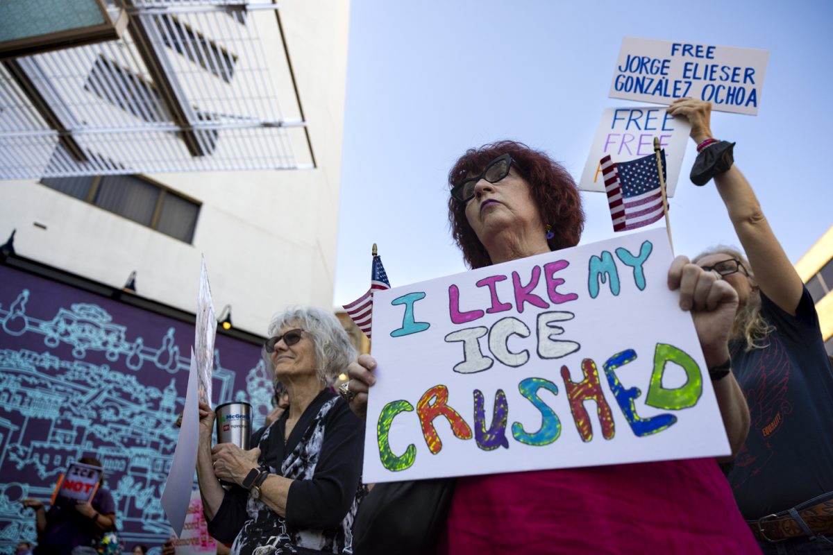 Community members hold up signs during a rally at the Pedestrian Mall in Iowa City, Iowa on Friday, Sep. 26, 2025. Community members gathered in protest against ICE’s arrest of Jorge Elieser González Ochoa while working at Bread Garden in Iowa City on Thursday, Sept. 25 at 11:00 a.m. Jorge’s family members, clergy, and elected leaders spoke at the rally.