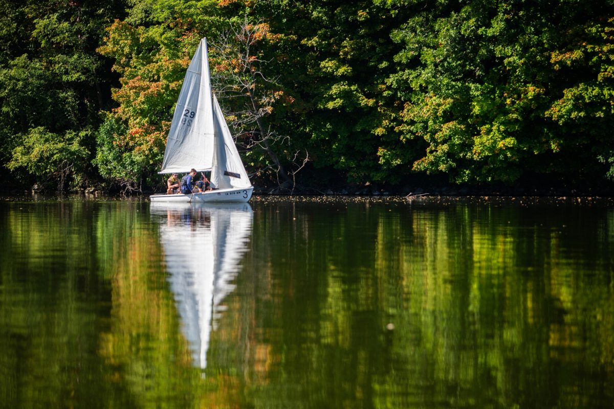A sailboat from the University of Iowa Sailing Club is seen on Lake Macbride in the Macbride Nature Recreation Area west of Solon on Saturday, Sept. 27, 2025.