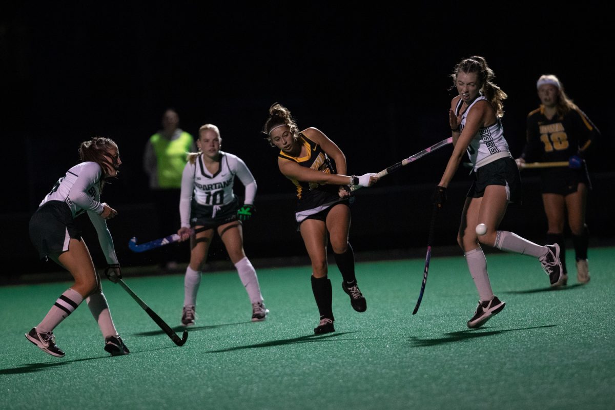 Midfielder Lexie Haig shoots the ball and scores at Grant Field on Oct. 23, 2025. The Iowa field hockey team beat Michigan State 6-0.