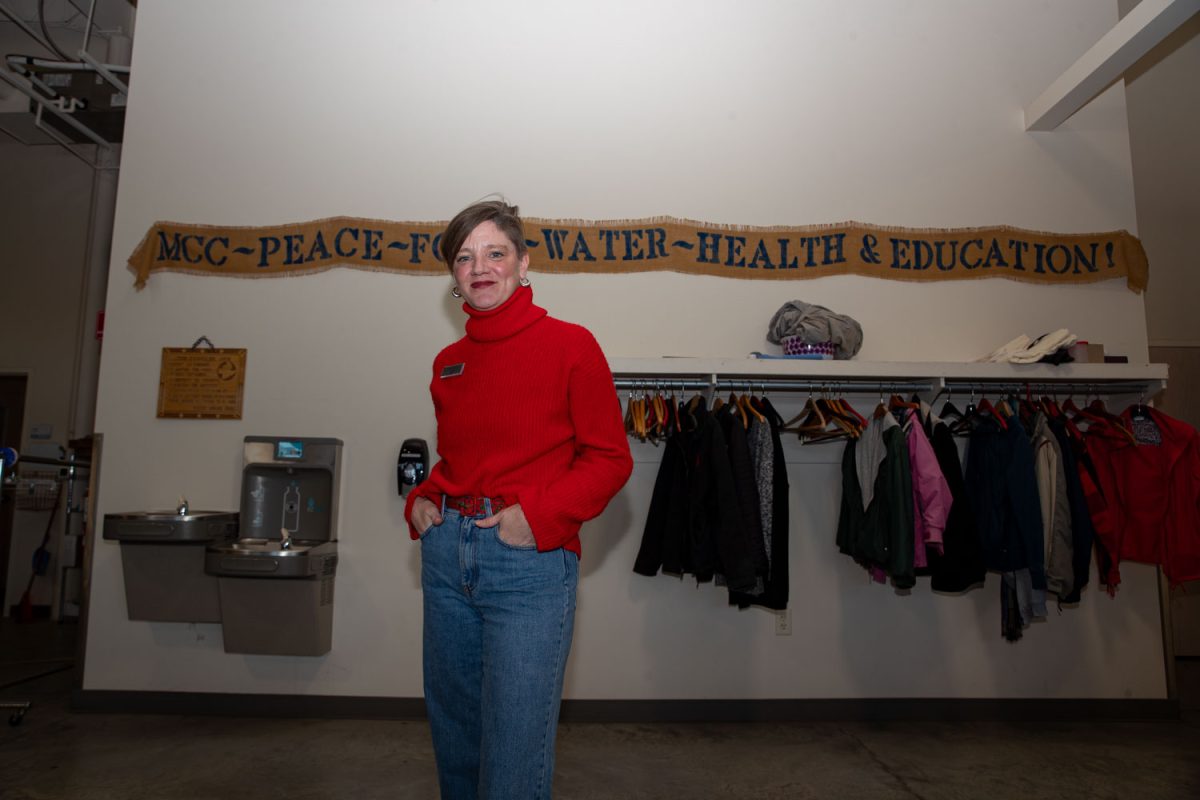 Amy Hospodarsky poses for a photo in the storeroom at Crowded Closet in Iowa City on Monday, Oct. 27, 2025. Hospodarsky is running from Iowa City Council this upcoming election, and has worked as director at the Crowded Closet for the past year because “It’s a mesh of all the causes I’m interested in.”