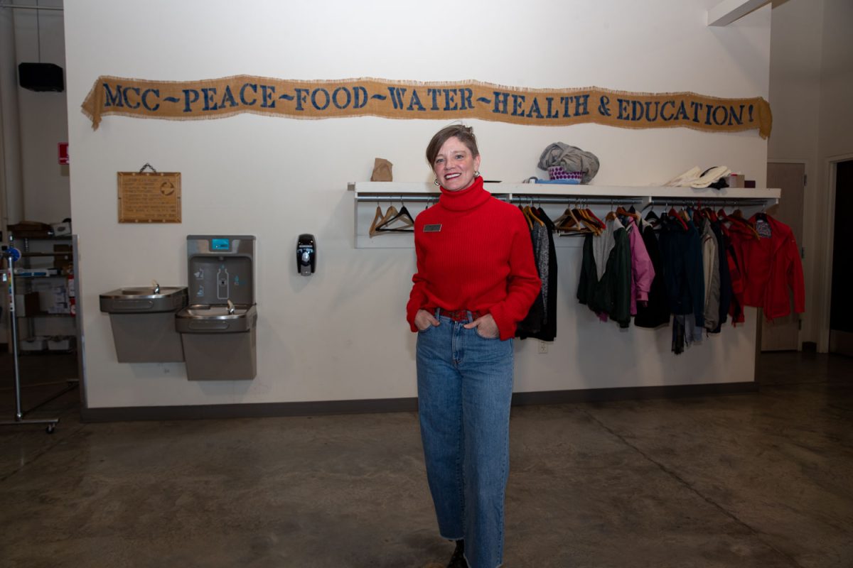 Amy Hospodarsky poses for a photo in the storeroom at Crowded Closet in Iowa City on Monday, Oct. 27, 2025. Hospodarsky is running from Iowa City Council this upcoming election, and has worked as director at the Crowded Closet for the past year because “It’s a mesh of all the causes I’m interested in.”