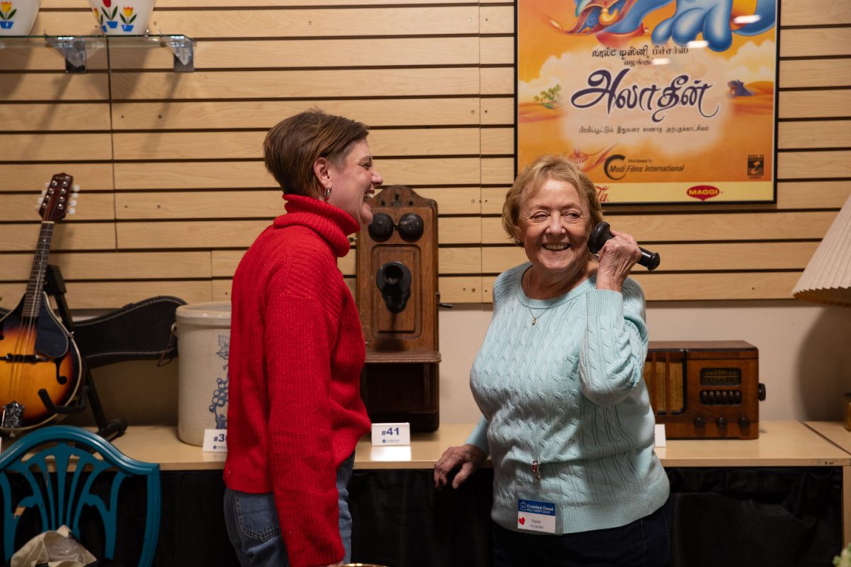 Amy Hospodarsky speaks to Karon, a volunteer, at Crowded Closet in Iowa City on Monday, Oct. 27, 2025. Hospodarsky is running from Iowa City Council this upcoming election, and has worked as director at the Crowded Closet for the past year because “It’s a mesh of all the causes I’m interested in.”