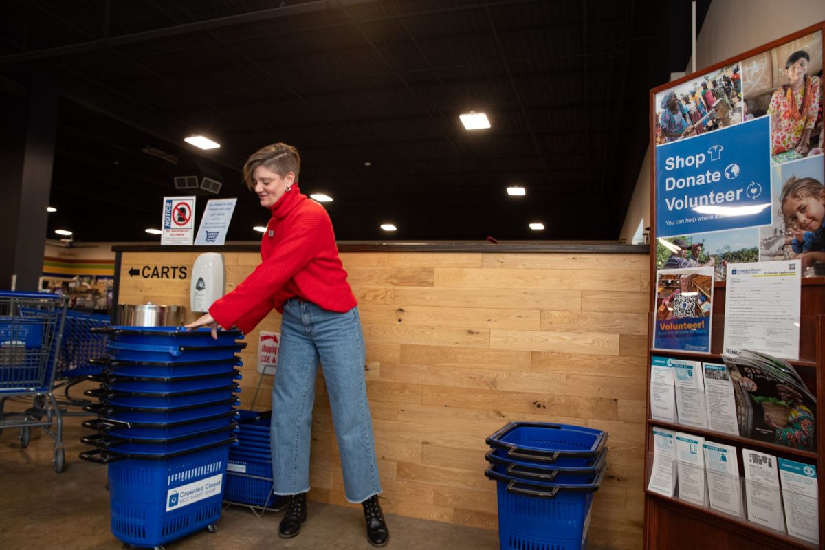 Amy Hospodarsky organizes bins at Crowded Closet in Iowa City on Monday, Oct. 27, 2025. Hospodarsky is running from Iowa City Council this upcoming election, and has worked as director at the Crowded Closet for the past year because “It’s a mesh of all the causes I’m interested in.”