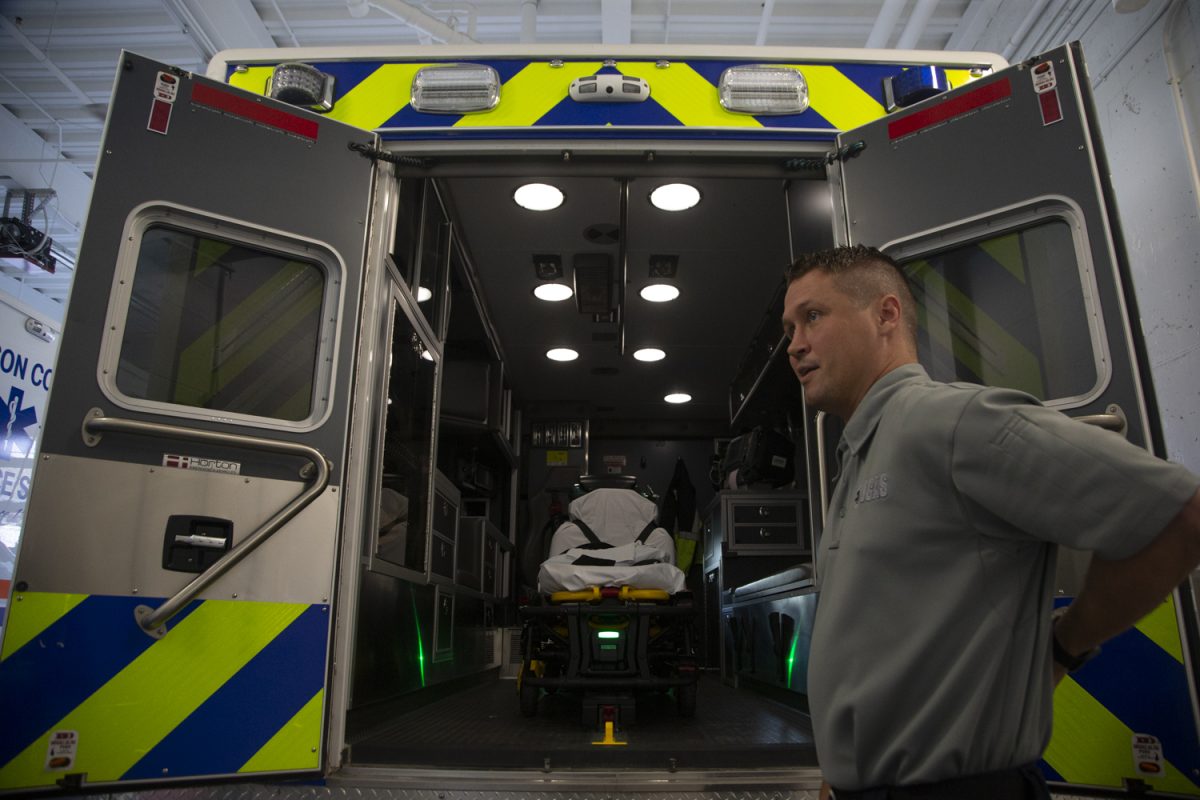Johnson County Ambulance Service Assistant Director Ben Symonds showcases an ambulance at the Johnson County Ambulance Medical Examiner Building on Wednesday, Sept. 27, 2023.