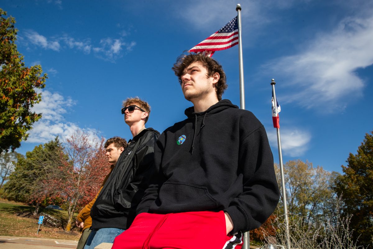 Craig Bantz (front) poses for a portrait outside the Iowa City Community School District Administration building on Election Day in Iowa City on Tuesday, Nov. 4, 2025. The ballot contains candidates for at-large and district B city council, in addition to the Iowa City Community School District board. By 11 a.m. the ICCSD Administration building had a turnout of 157 voters according to the Johnson County website. (John Charlson/The Daily Iowan)