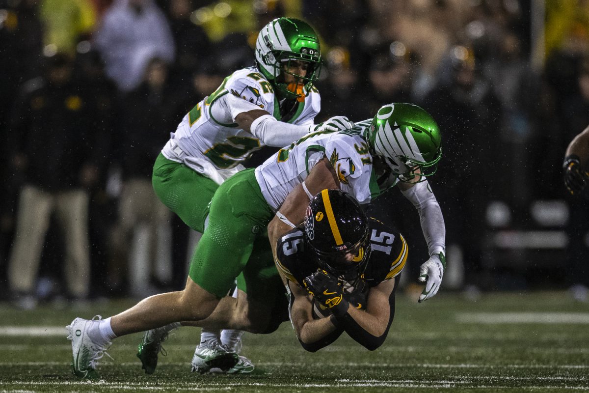 Iowa wide receiver Reece Vander Zee flies to first down marker during a football game between the No. 20 Iowa Hawkeyes and the No. 9 Oregon Ducks at Kinnick Stadium in Iowa City, Iowa on Saturday, Nov 8, 2025. The Ducks defeated the Hawkeyes 18-6. Vander Zee secured 25 receiving yards for the Hawkeyes.