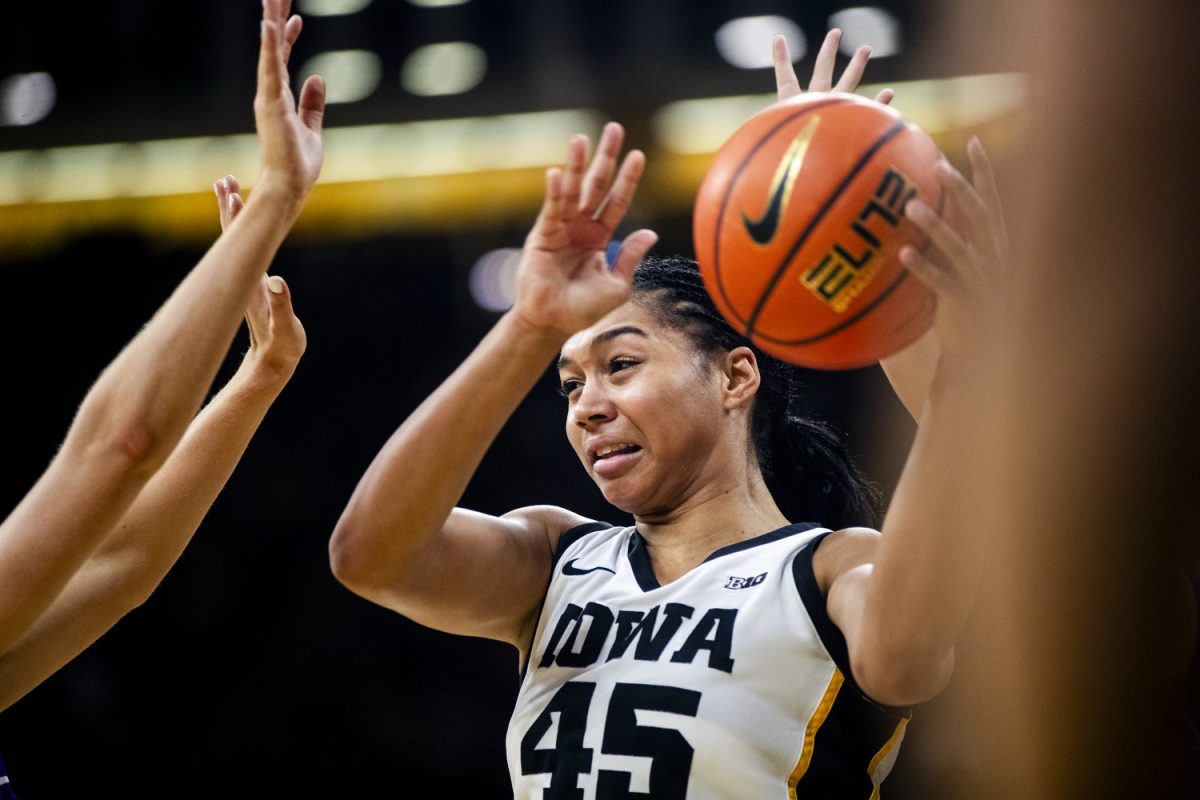 Iowa forward Hannah Stuelke looks to pass the ball during an Iowa women's basketball game against Evansville on Sunday, Nov. 9, 2025, at Carver-Hawkeye Arena in Iowa City, Iowa. Stuelke went six for seven on field goals. The Hawkeyes defeated the Purple Aces, 119-43.