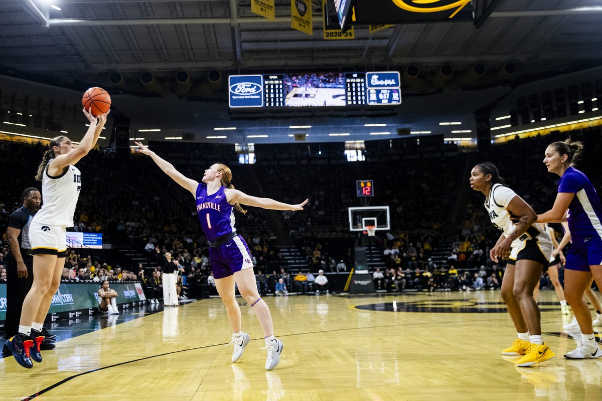 Iowa guard Addie Deal shoots a three-pointer during an Iowa women's basketball game against Evansville on Sunday, Nov. 9, 2025, at Carver-Hawkeye Arena in Iowa City, Iowa. Deal put up 11 points. The Hawkeyes defeated the Purple Aces, 119-43.