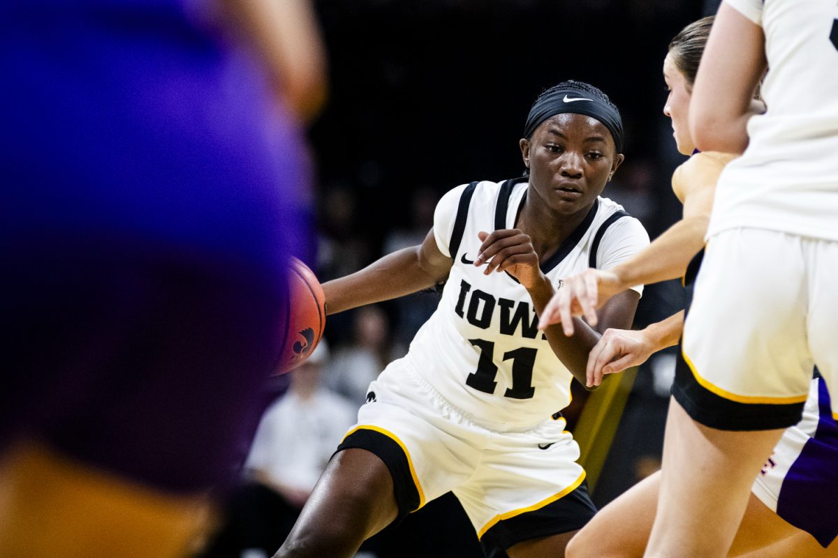 Iowa guard Chazadi 'Chit-Chat' Wright dribbles the ball during an Iowa women's basketball game against Evansville on Sunday, Nov. 9, 2025, at Carver-Hawkeye Arena in Iowa City, Iowa. Wright earned 16 points. The Hawkeyes defeated the Purple Aces, 119-43.