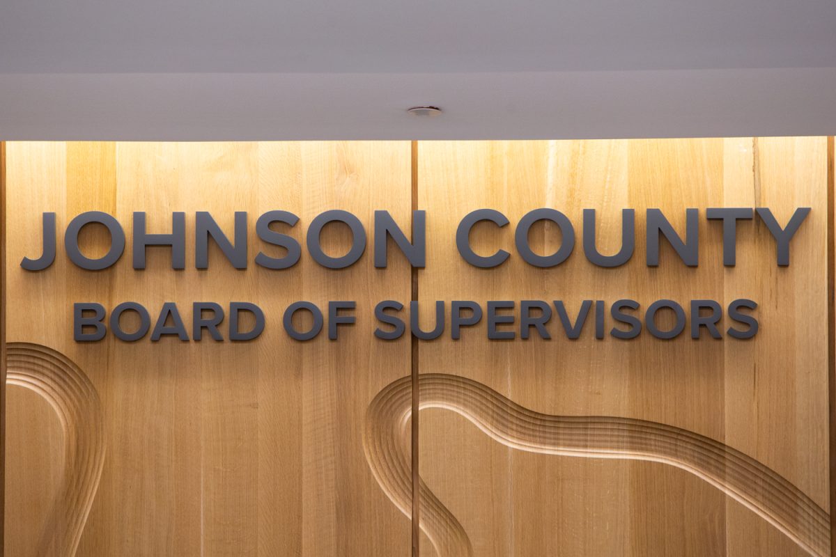 The Johnson County sign is seen during a formal meeting of the Johnson County Board of Supervisors on Wednesday, Nov. 12, 2025. The school board holds a Work Session meeting every Wednesday at 9am inside the County Health and Human Services Building.