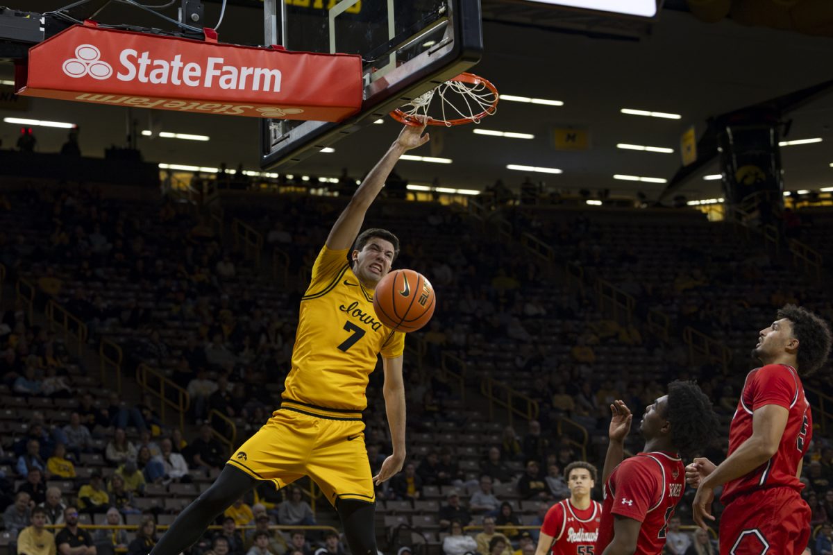 Iowa forward Alvaro Folgueiras dunks the ball during a basketball game between the Iowa Hawkeyes and the Southeast Missouri State Redhawks at Carver-Hawkeye Arena on Thursday, Nov. 18, 2025. The Hawkeyes defeated the Redhawks 99-70.