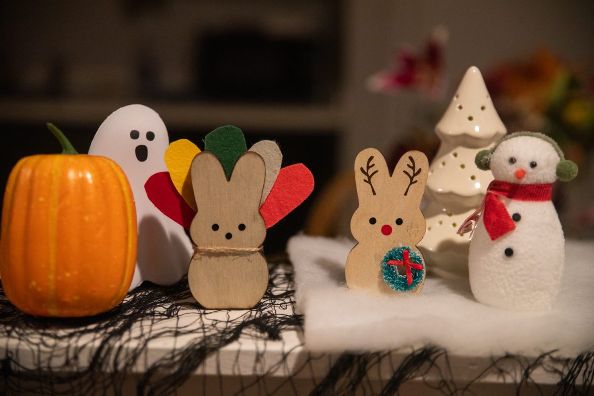 Photo illustration of Halloween and Christmas decorations.