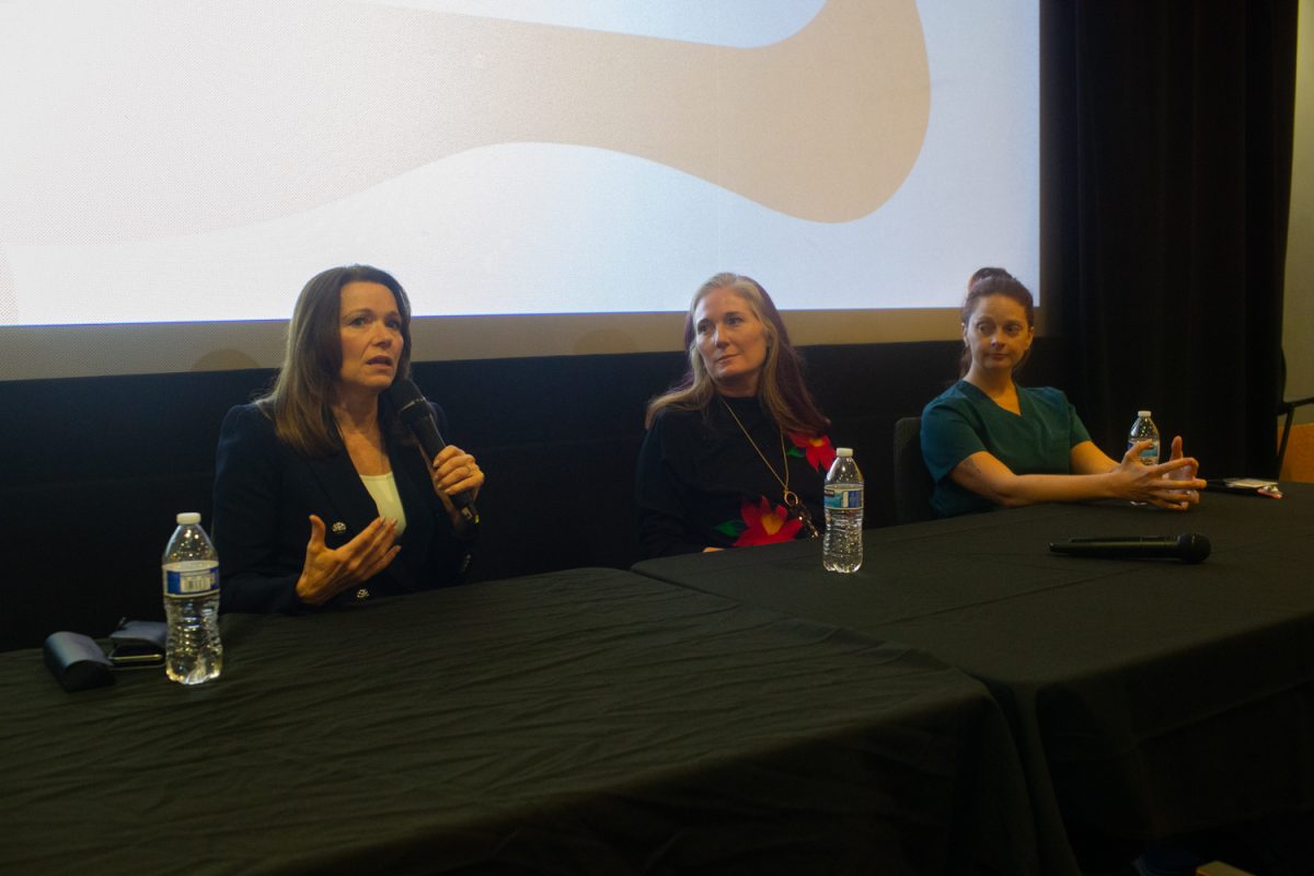 Christina Bohannan, Dr. Francesca Turner, and Dr. Hardy-Fairbanks, speak at the Maternal and Reproductive Health Panel in Iowa City, on Wednesday, November 19, 2025. The two doctors expressed their thoughts as OBGYNs, and Bohannan expressed her thoughts as a law professor and state representative.