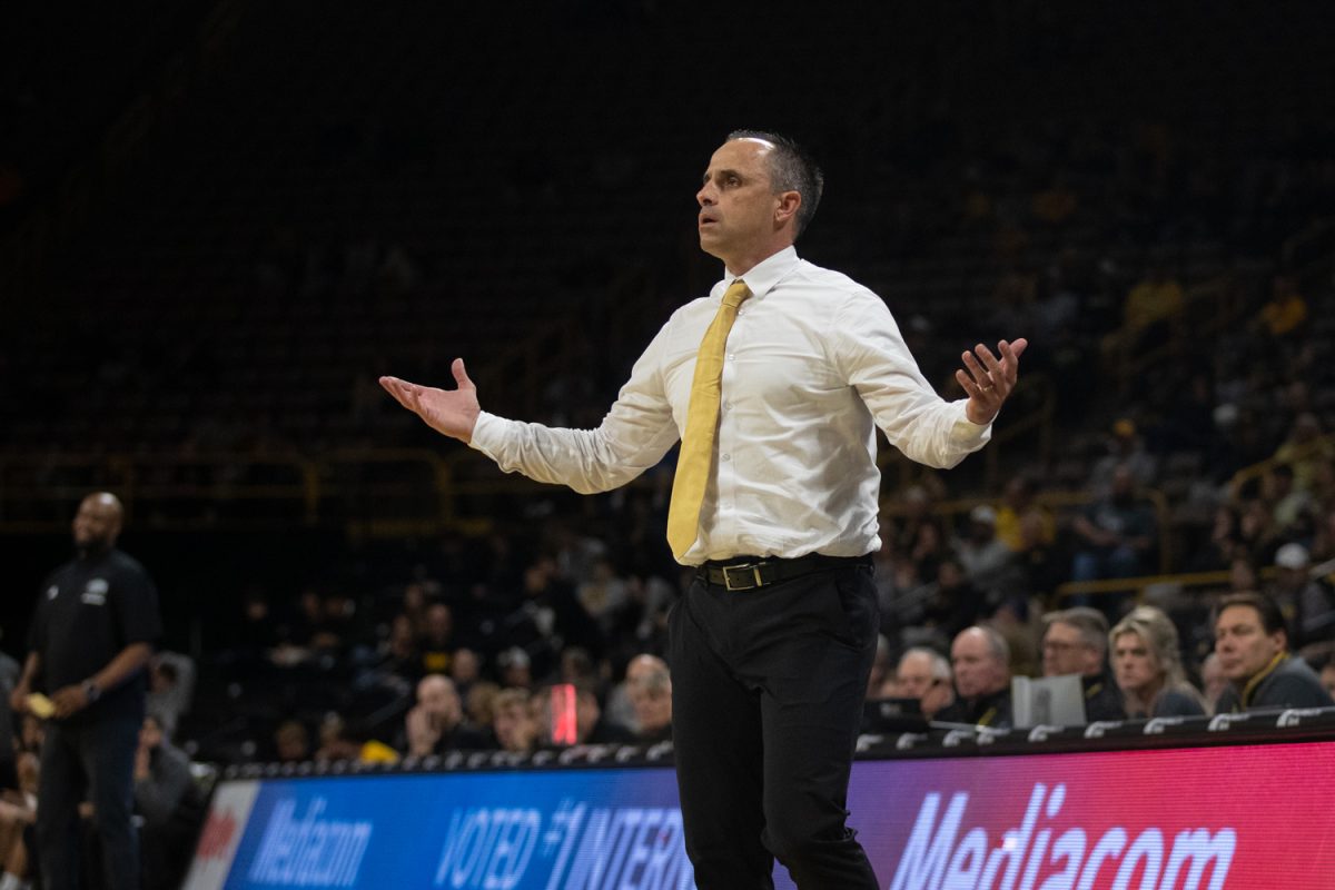 Head coach Ben McCollum questions a referee’s call during a basketball game between the Iowa Hawkeyes and the Chicago State Cougars at Carver-Hawkeye Arena on Thursday, Nov. 20, 2025. The Hawkeyes defeated the Cougars 93-54. McCollum is coaching his first season with Iowa and has started the season 5-0.