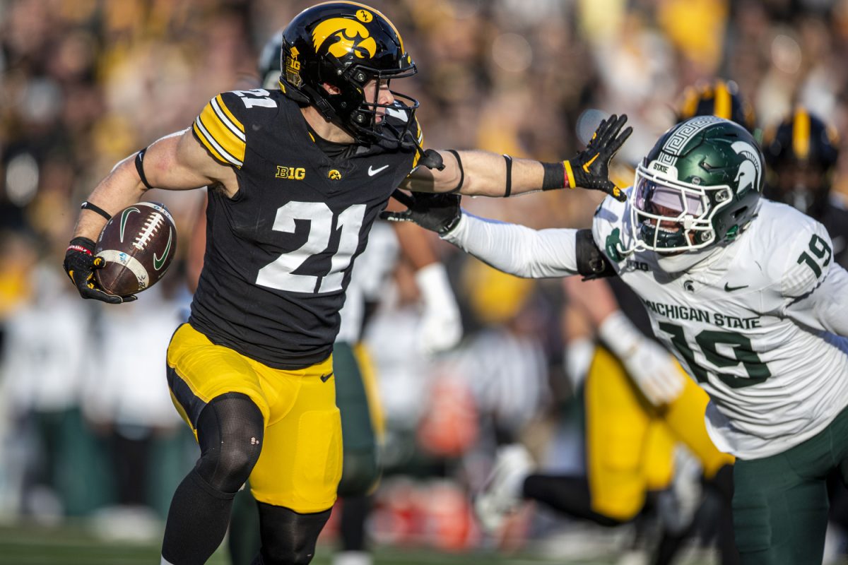 Iowa wide receiver Kaden Wetjen carries the ball during a football game between Michigan State and Iowa at Kinnick Stadium on Nov. 22, 2025. Wetjen carried the punt return all the way to the end zone for a 62 yard touchdown. The Hawkeyes defeated the Spartans 20-17.