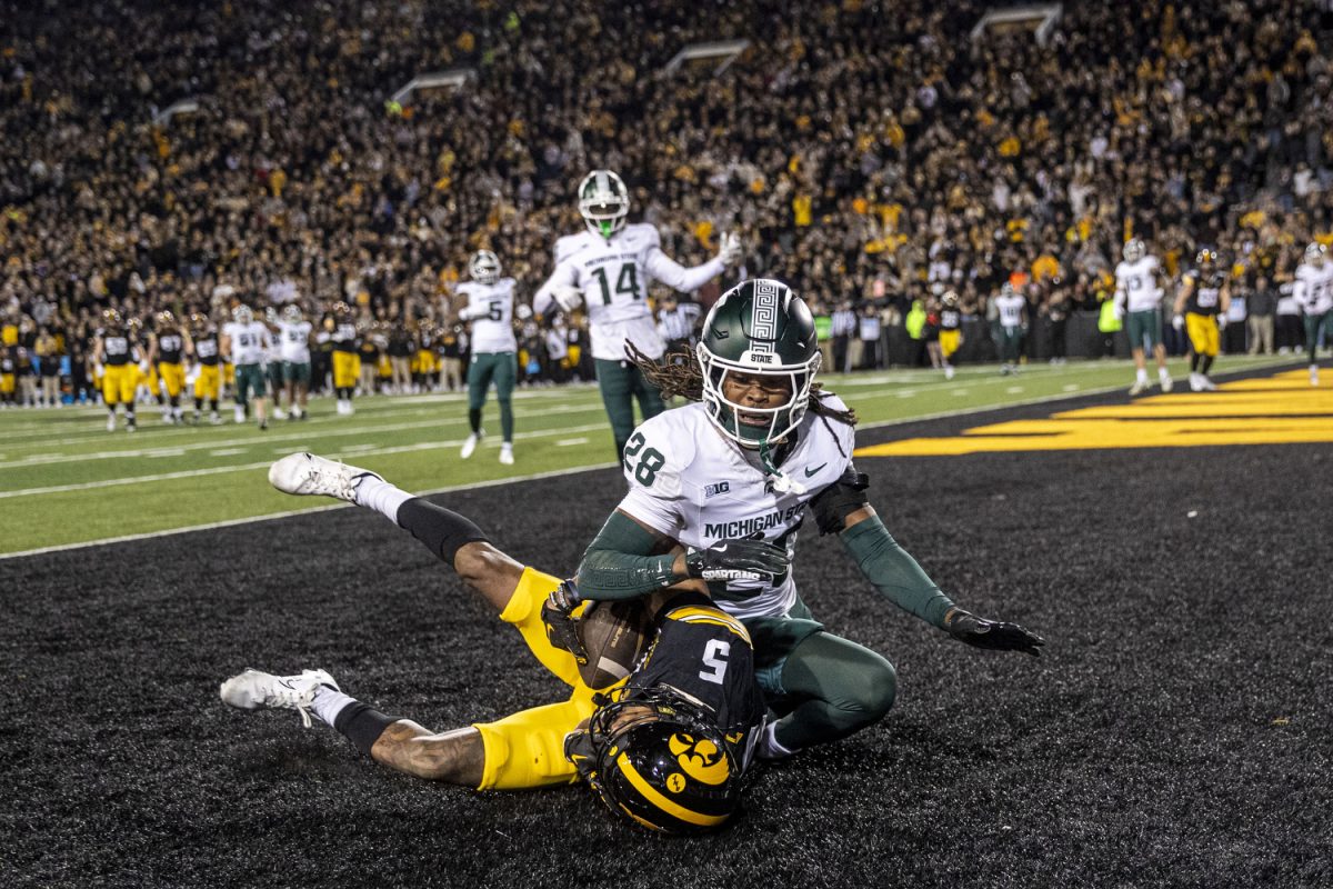 Iowa wide receiver Jacob Gill catches the ball in the end zone during a football game between Michigan State and Iowa at Kinnick Stadium on Nov. 22, 2025. Gill had one touchdown. The Hawkeyes defeated the Spartans 20-17.