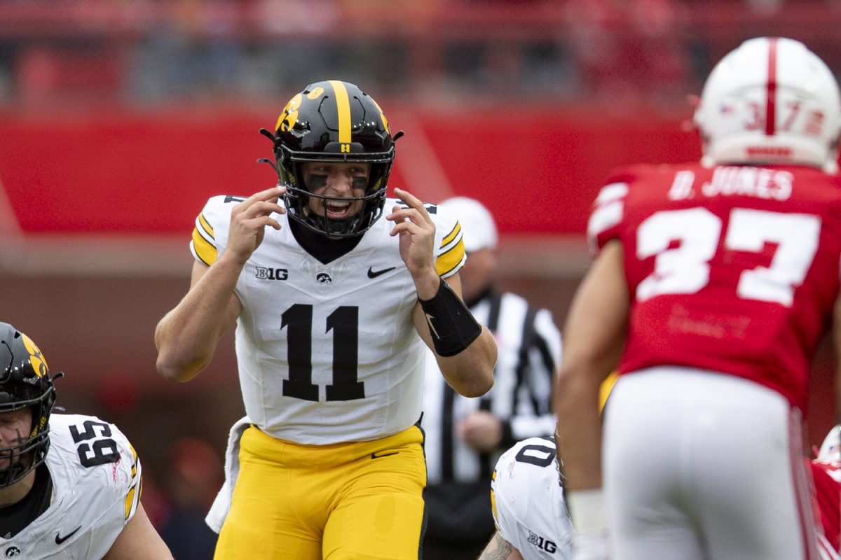 Iowa quarterback Mark Gronowski calls a play during a football game between Iowa and Nebraska at Memorial Stadium in Lincoln, Nebraska on Friday, Nov. 28, 2025. The Hawkeyes defeated the Cornhuskers 40-16.