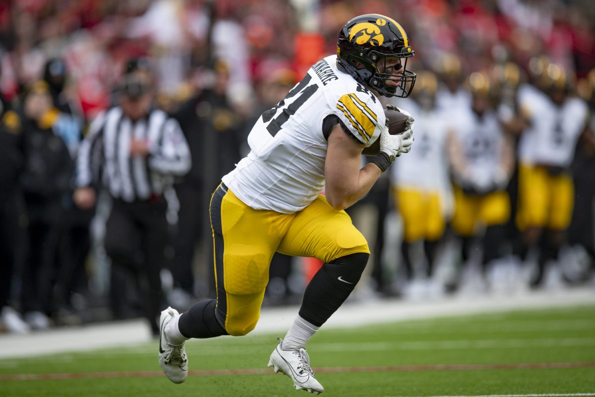 Iowa wide receiver DJ Vonnahme runs the ball during a football game between Iowa and Nebraska at Memorial Stadium in Lincoln, Nebraska on Friday, Nov. 28, 2025. The Hawkeyes defeated the Cornhuskers 40-16.