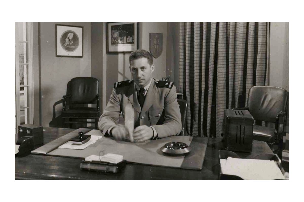 Navy Lt. Budd Schulberg, an officer in the OSS Field Photo-War Crimes unit supervised compilation of The Nazi Plan and Nazi Concentration Camps for presentation at Nuremberg trial.