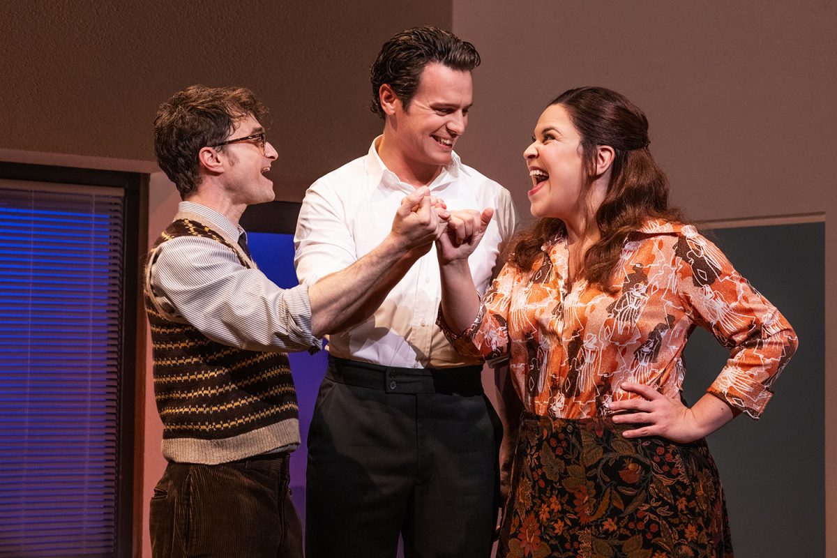DANIEL RADCLIFFE as Charley Kringas, JONATHAN GROFF as Franklin Shepard, LINDSAY MENDEZ as Mary Flynn in 'Merrily We Roll Along' Courtesy of Sony Pictures Classics