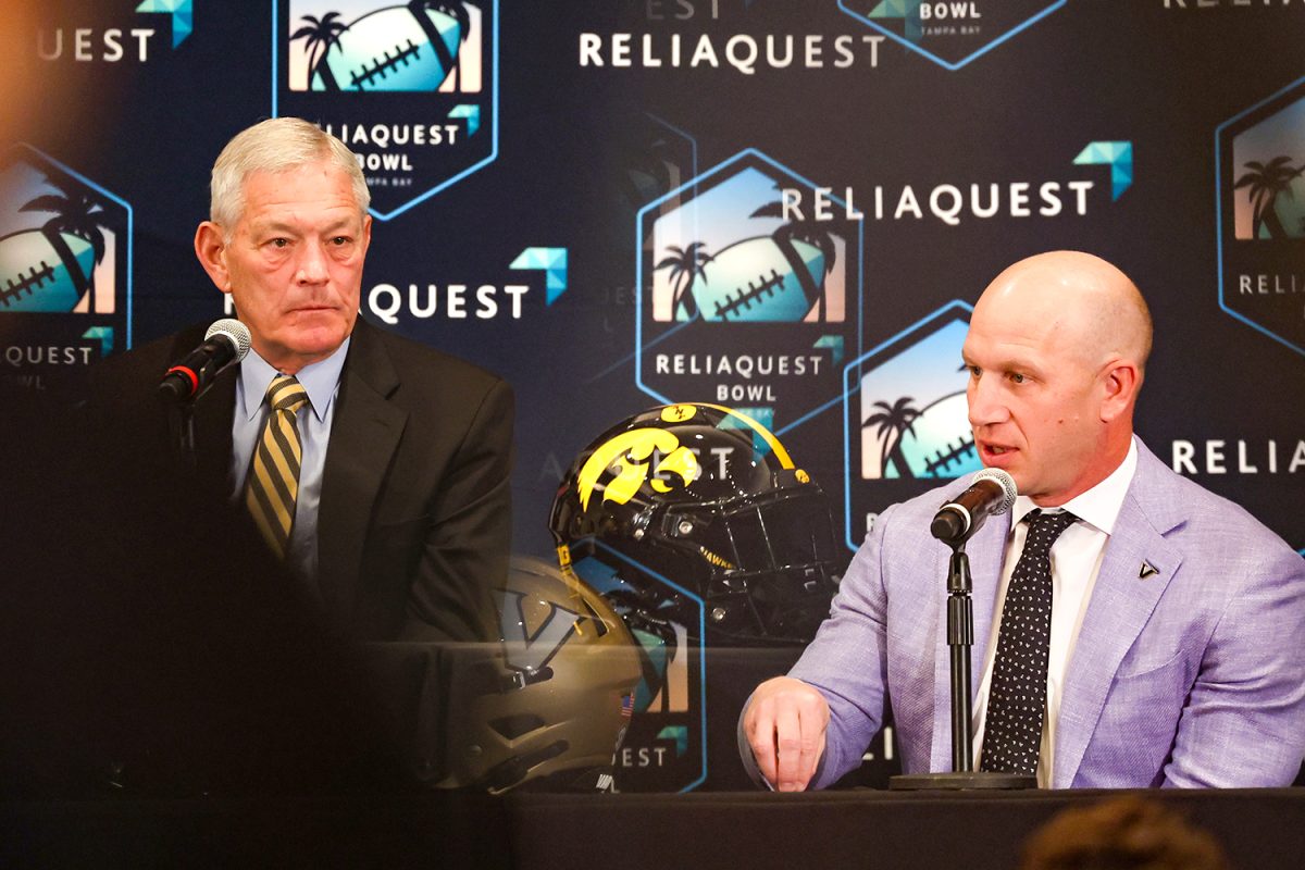 Iowa head coach Kirk Ferentz and Vanderbilt head coach Clark Lea address the media during a press conference at Hyatt House Tampa Airport Hotel Tuesday, Dec. 30, 2025.(Emma Calabro/The Daily Iowan)