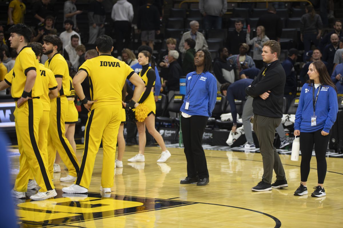 A security guard is seen during an Iowa men’s basketball game against Xavier at Carver-Hawkeye Arena in Iowa City on Nov. 14. 