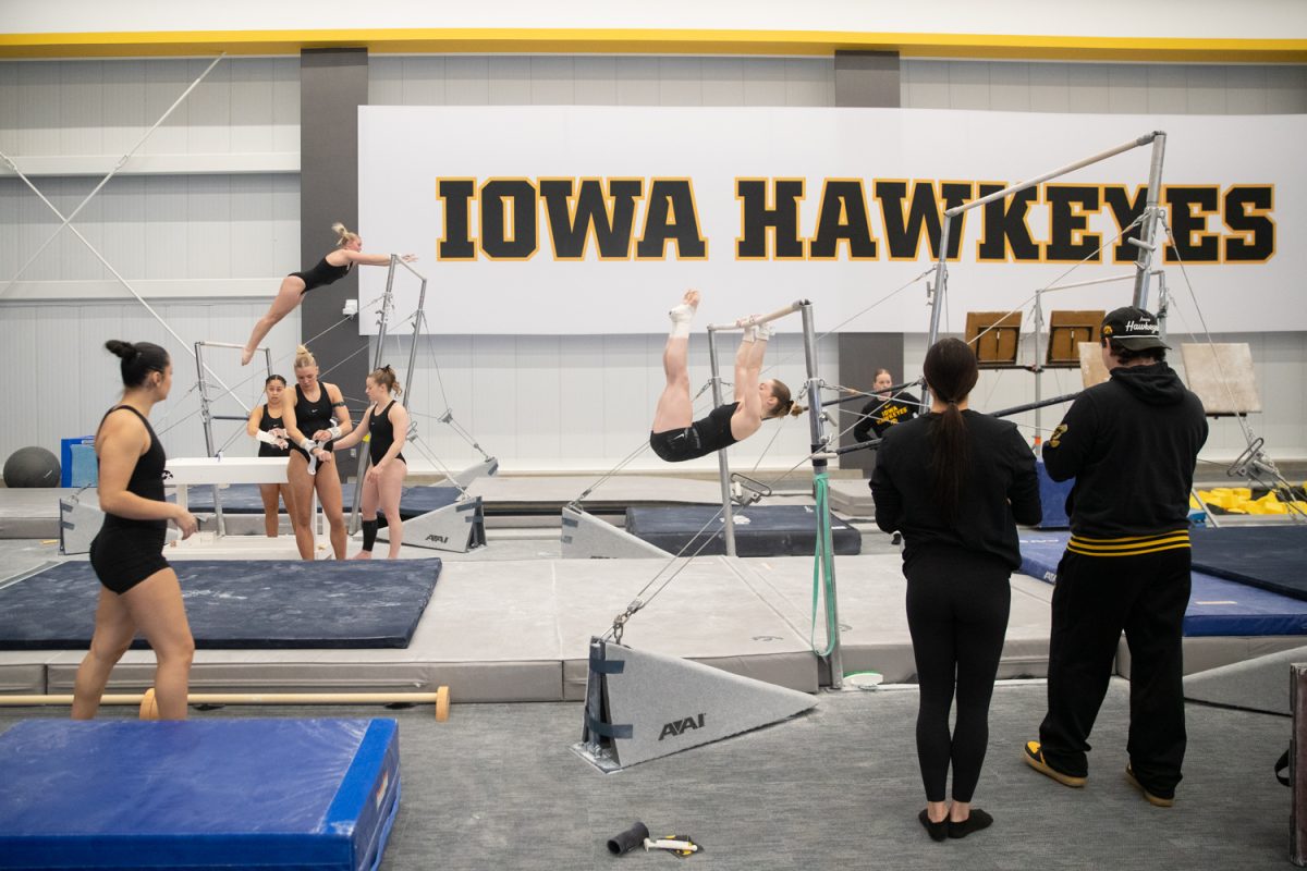 Gymnasts warm up and prepare for their “mock meet” on Saturday, Dec. 6, 2025 at the Nagle-Duda Gymnastics &amp; Spirit Squads Training Center. The gymnastics team moved into the new facility in January of 2025. It was built with a five million dollar donation from Mary Lee Nagle Duda and Fritz Duda.