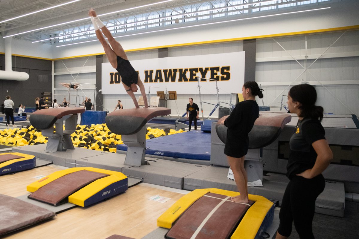 First year Sophie Schriever competes her vault on Saturday, Dec. 6, 2025 at the Nagle-Duda Gymnastics &amp; Spirit Squads Training Center. The gymnastics team moved into the new facility in January of 2025. It was built with a five million dollar donation from Mary Lee Nagle Duda and Fritz Duda.
