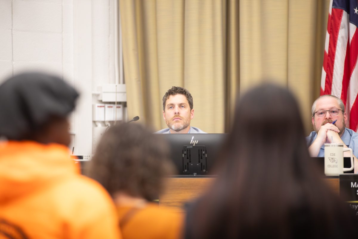 Josh Moe listens to guest speakers who talk about strategic values and community impact to the city council members. The city council held its last meeting of the year on Dec. 9, 2025.