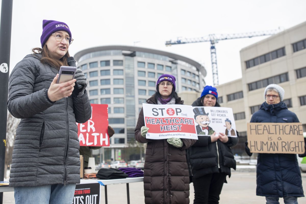 Katie Daugherty, a nurse at the UI Health Care downtown campus, speaks during a rally for healthcare outside of the University of Iowa Hospitals and Clinics main campus on Tuesday, Dec. 11, 2025. Members of SEIU Minnesota and Iowa, Iowa City for Community Improvement Action fund, and local officials expressed dismay with issues including availability of lawmakers to speak with constituents and healthcare costs.