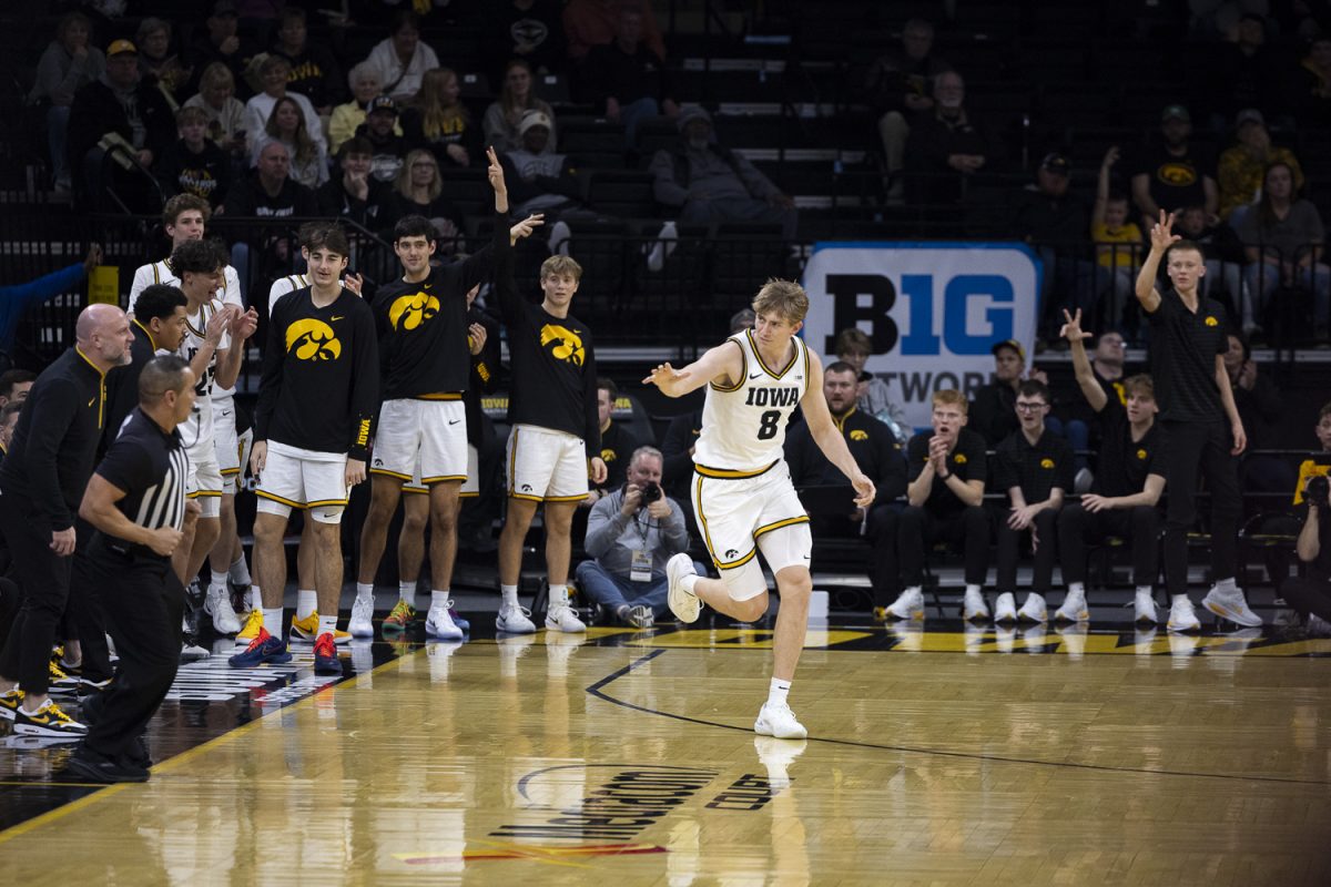 Iowa forward Cooper Koch celebrates after scoring during a men’s basketball game between the Iowa Hawkeyes and Western Michigan Broncos at Carver-Hawkeye Arena on Sunday, Dec. 14, 2025. Koch earned nine points. The Hawkeyes defeated the Broncos 91-51. (Samantha DeFily/The Daily Iowan)