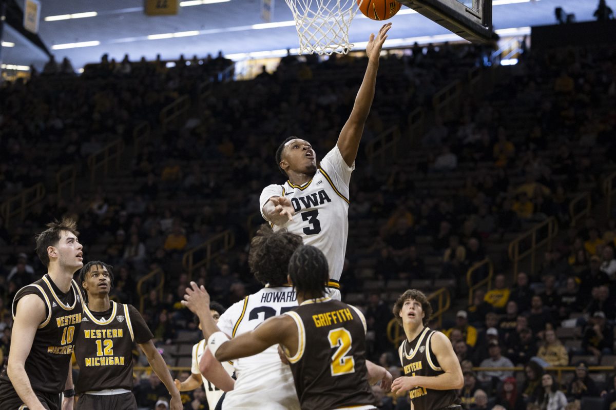 Iowa forward Cam Manyawu goes for a layup during a men’s basketball game between the Iowa Hawkeyes and Western Michigan Broncos at Carver-Hawkeye Arena on Sunday, Dec. 14, 2025. Manyawu contributed 11 points. The Hawkeyes defeated the Broncos 91-51. (Samantha DeFily/The Daily Iowan)