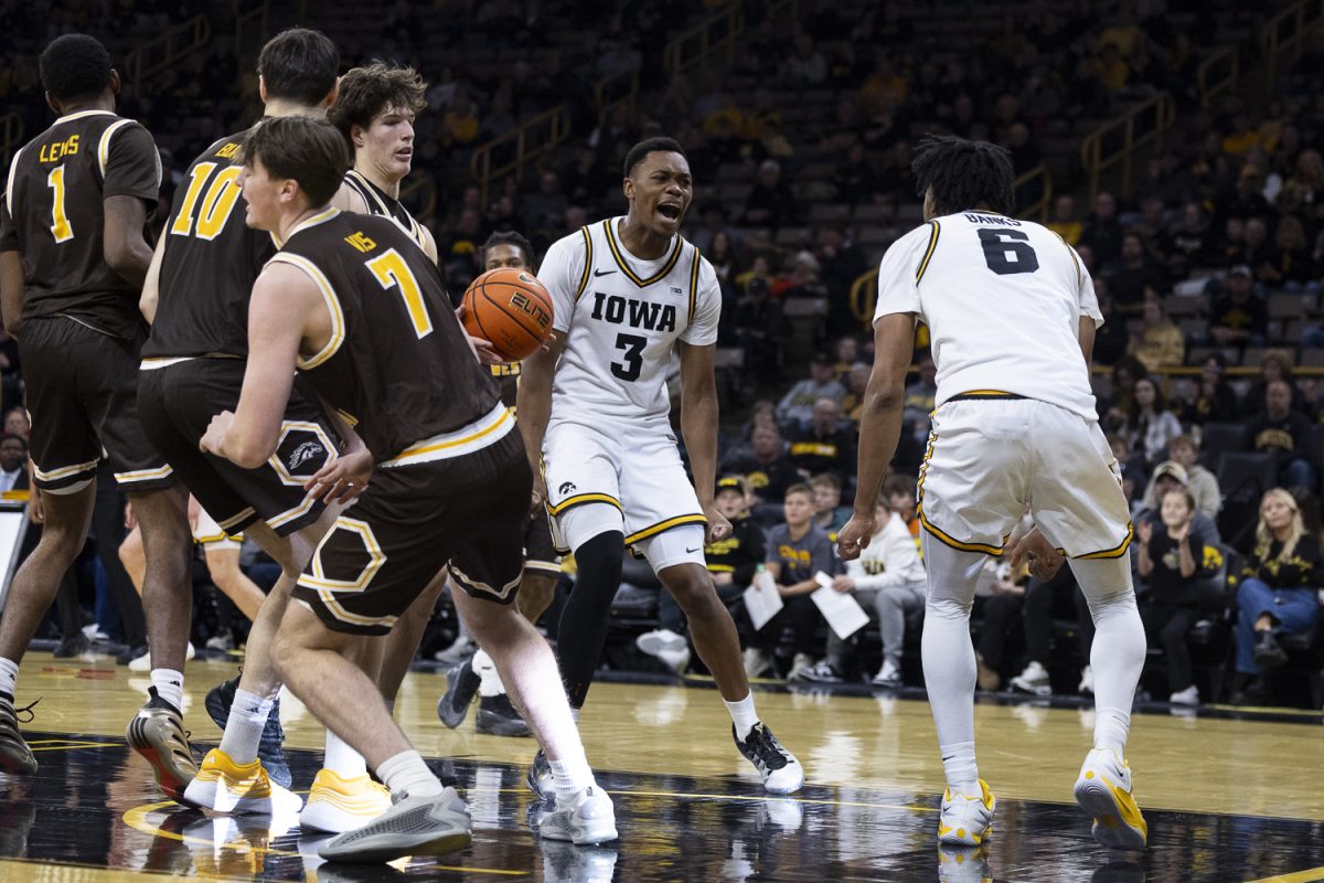 Iowa forward Cam Manyawu and guard Tavion Banks yells out to each other during a men’s basketball game between the Iowa Hawkeyes and Western Michigan Broncos at Carver-Hawkeye Arena on Sunday, Dec. 14, 2025. Manyawu had 11 points. The Hawkeyes defeated the Broncos 91-51. (Samantha DeFily/The Daily Iowan)