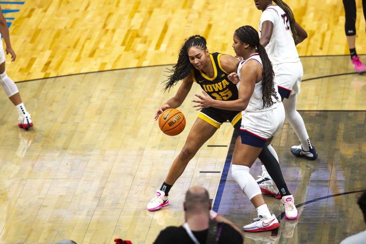 Iowa forward Hannah Stuelke dribbles the ball during a basketball game between the Iowa Hawkeyes and the UConn Huskies at the Barclays Center in Brooklyn, NY on Saturday, Dec. 20, 2025. The Huskies defeated the Hawkeyes 90-64. (Emma Calabro/The Daily Iowan)
