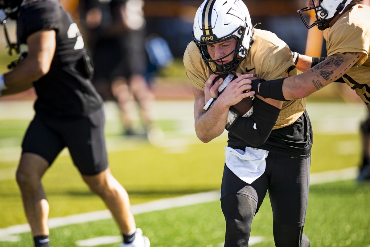 Vanderbilt quarterback Diego Pavia runs the ball during a Vanderbilt football practice at Tampa Jesuit High School in Tampa, Florida, on Saturday Dec 27, 2025. The Iowa Hawkeyes and the Vanderbilt Commodores will face off in the 2025 ReliaQuest Bowl on Wednesday, Dec. 31, at Raymond James Stadium. (Emma Calabro/The Daily Iowan)