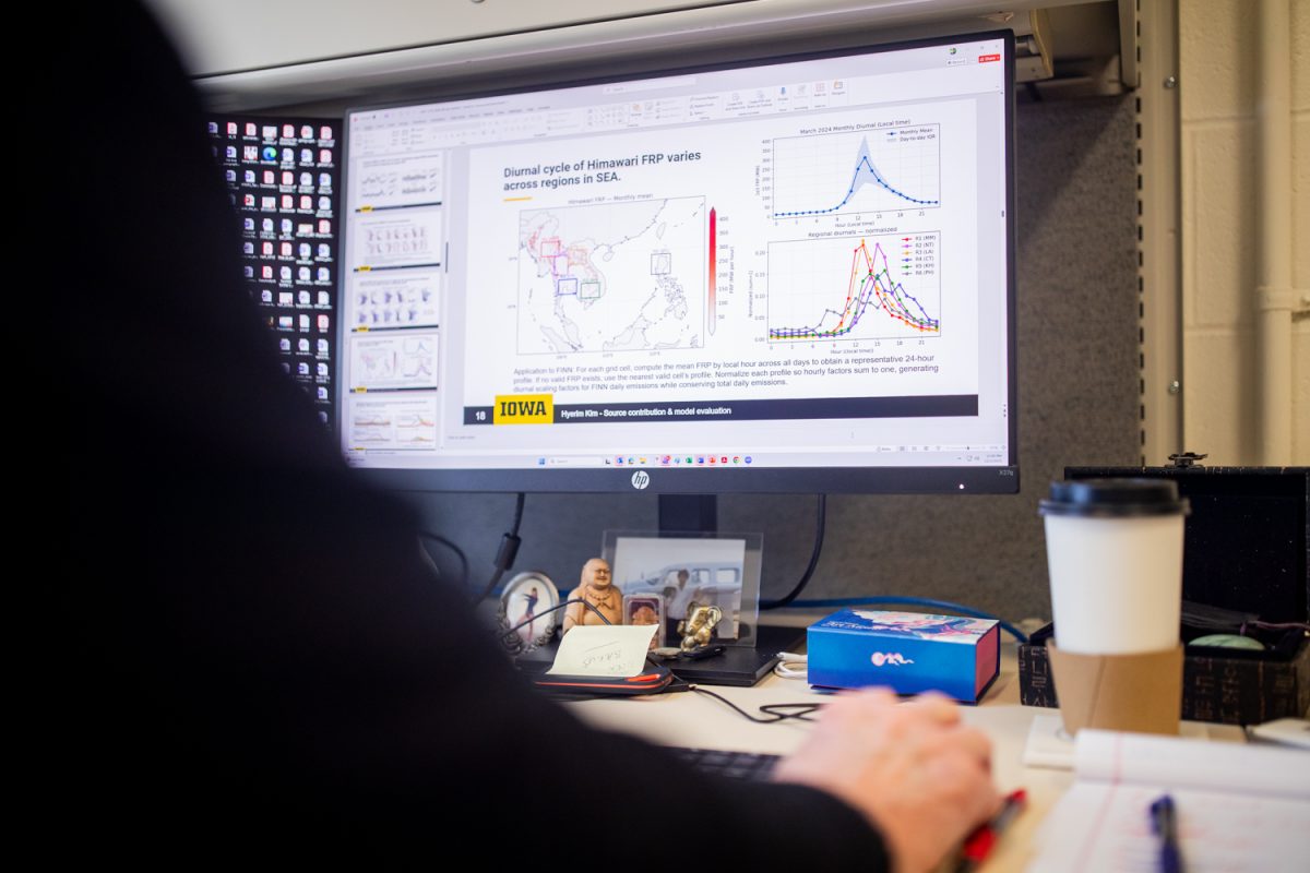 Gregory Carmichael, Professor of Chemical and Biochemical Engineering Director, reviews lecture slide model in his personal office at Seamans Center in Iowa City, Iowa on Tuesday, Dec. 2, 2025. Carmichael is currently a professor for Applied Mathematical and Computer Sciences in the College of Engineering at the University of Iowa.