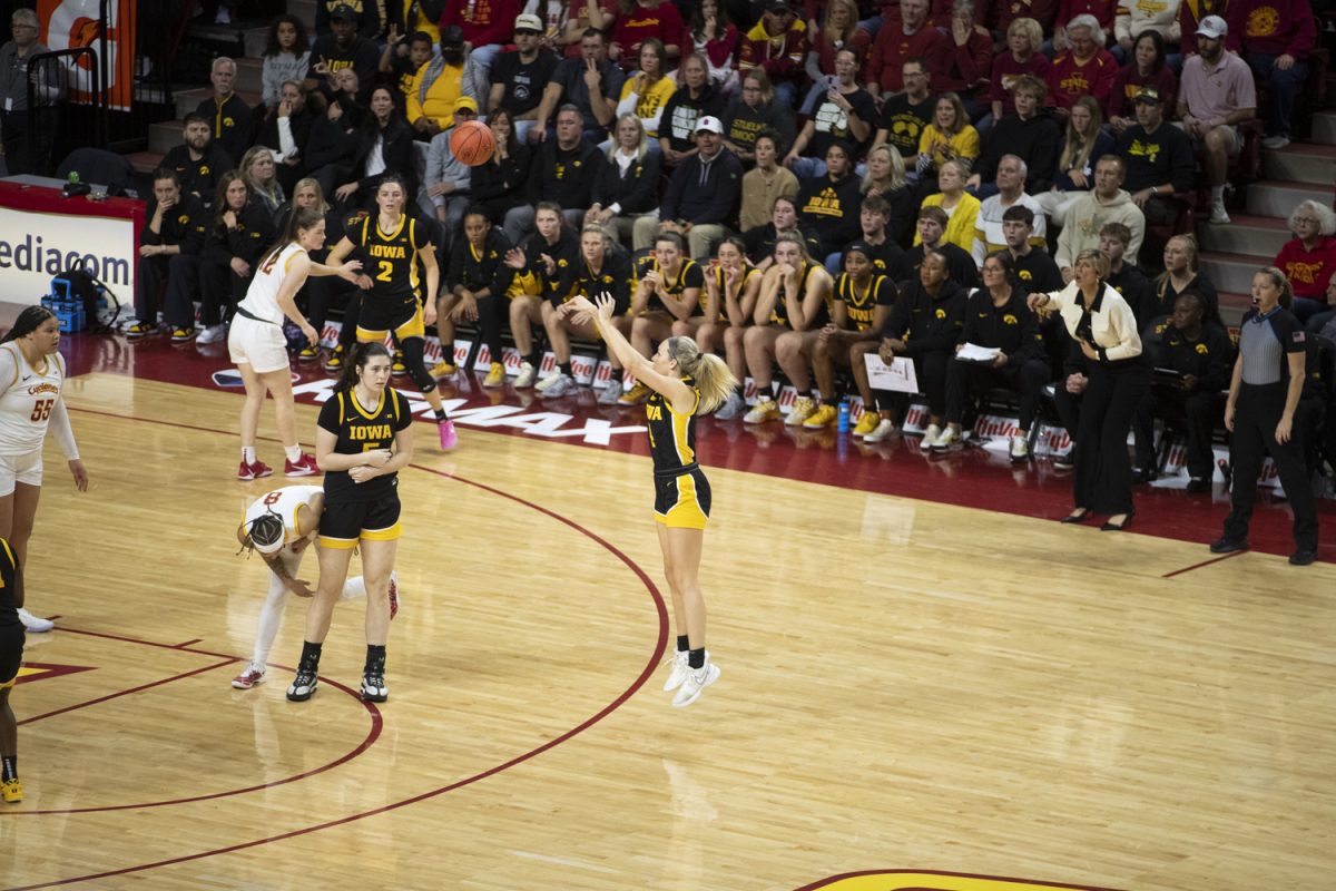 Iowa Guard Kylie Feuerbach hits three during a basketball game between the Iowa Hawkeyes and the Iowa State Cyclones at Hilton Coliseum on Wednesday, Dec. 10, 2025. The Hawkeyes fell to the Cyclones 74-69.