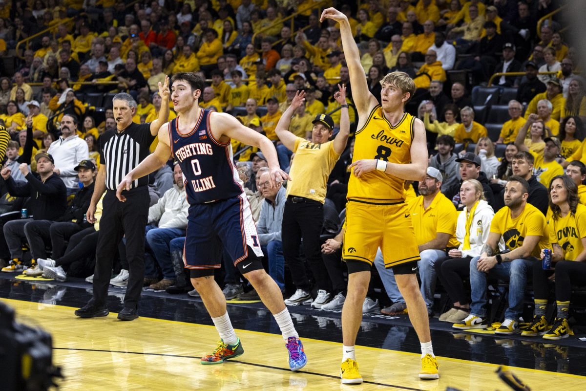 Iowa forward Cooper Koch shoots the ball during a basketball game between the No. 19 Iowa Hawkeyes and the No. 16 Illinois Fighting Illini at Carver-Hawkeye Arena on Sunday, Jan. 11, 2026. Koch added 10 points. The Fighting Illini defeated the Iowa Hawkeyes 75-69. (Samantha DeFily/The Daily Iowan)