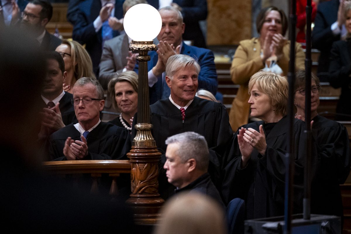 Iowa Supreme Court justices clap as Gov. Kim Reynolds gives the Condition of the State address during the second day of the 2026 Iowa legislative session at the Iowa State Capitol in Des Moines on Tuesday, Jan. 13, 2026. (Samantha DeFily/The Daily Iowan)