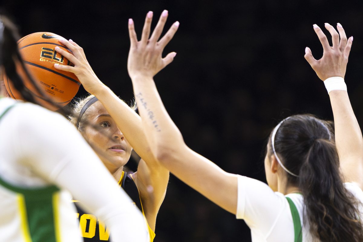Iowa guard Kylie Feuerbach faces off against Oregon guard Katie Fiso during an Iowa women’s basketball game against Oregon on Thursday, Jan. 15, 2026, at Carver-Hawkeye Arena in Iowa City, Iowa. Feurbach accumulated 11 points. (Samantha DeFily/The Daily Iowan)
