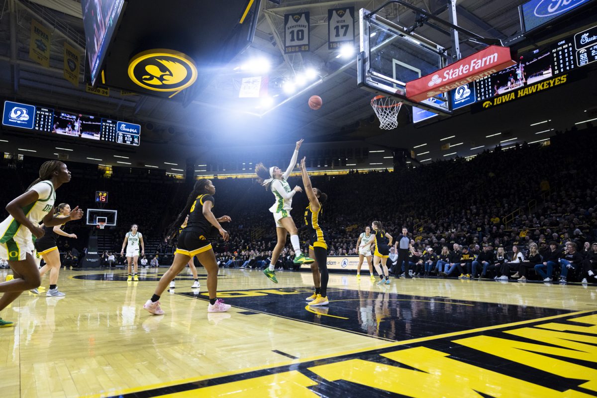 Oregon forward Sarah Rambus shoots the ball past Iowa forward Hannah Stuelke during an Iowa women’s basketball game against Oregon on Thursday, Jan. 15, 2026, at Carver-Hawkeye Arena in Iowa City, Iowa. Rambus had six points. (Samantha DeFily/The Daily Iowan)