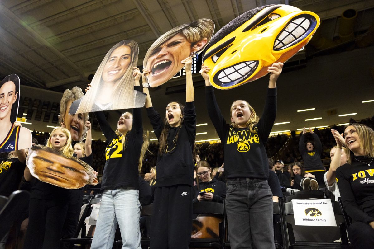 Young Hawkeye fans cheer during an Iowa women’s basketball game against Oregon on Thursday, Jan. 15, 2026, at Carver-Hawkeye Arena in Iowa City, Iowa. (Samantha DeFily/The Daily Iowan)