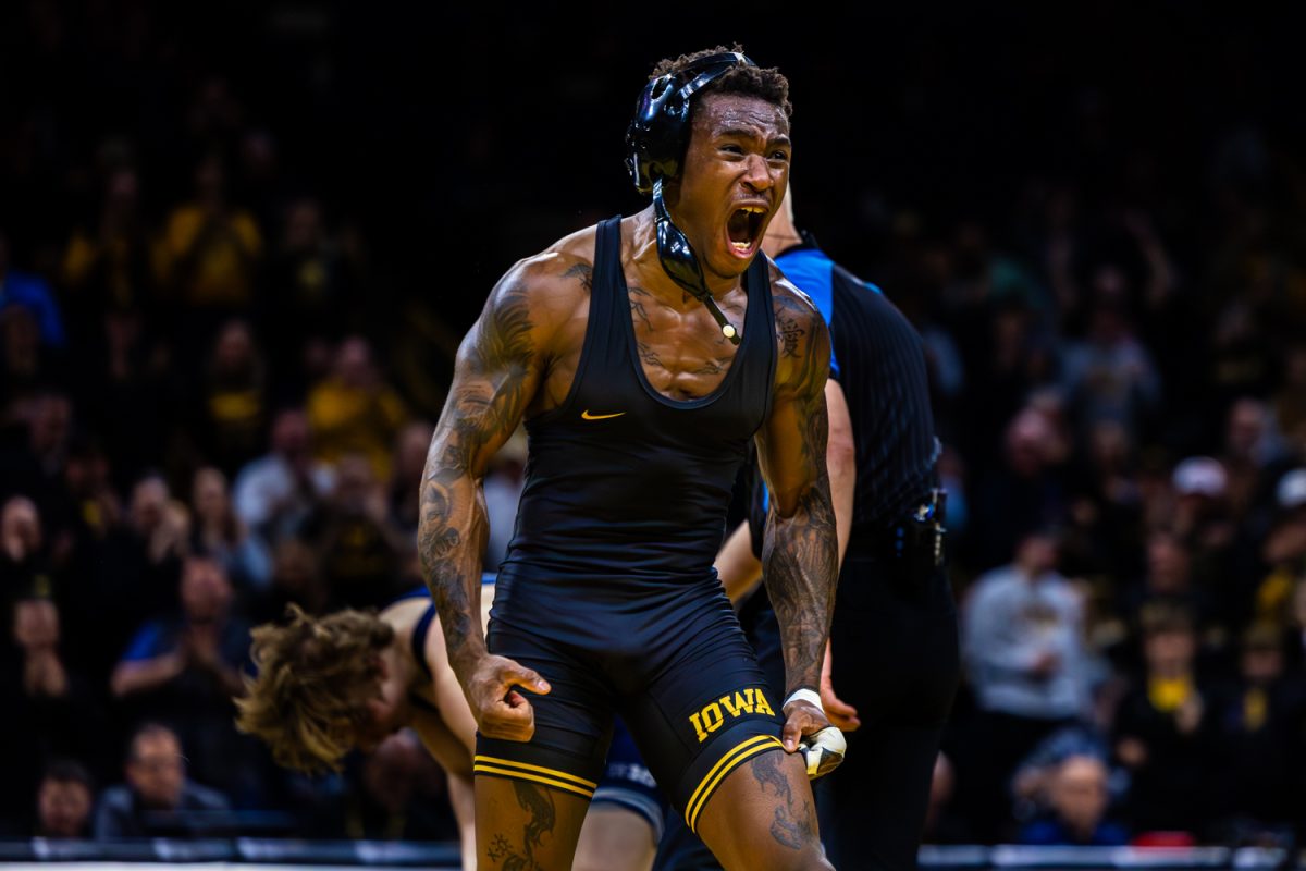 Iowa No. 11 141-pounder Nasir Bailey screams after upsetting Penn State’s No. 7 Braden Davis during a Big10 top-five wrestling dual between the No. 4 Iowa Hawkeyes and the No. 1 Penn State Nittany Lions at Carver-Hawkeye Arena in Iowa City, Iowa on Friday, Jan. 16, 2026. Bailey defeated Davis 3-2. The Nittany Lions defeated the Hawkeyes 32-3.