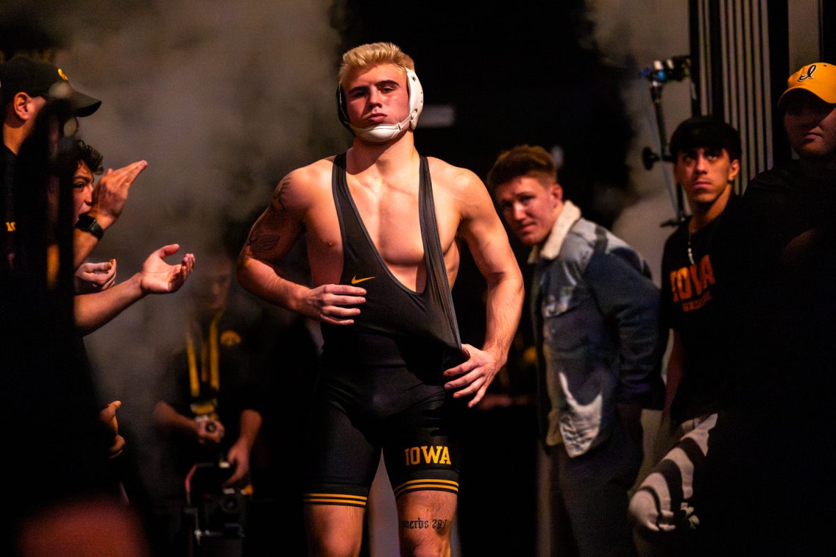 Iowa No. 1 184-pounder Angelo Ferrari walks out of tunnel before against Penn State’s No. 4 Rocco Welsh during a Big10 top-five wrestling dual between the No. 4 Iowa Hawkeyes and the No. 1 Penn State Nittany Lions at Carver-Hawkeye Arena in Iowa City, Iowa on Friday, Jan. 16, 2026. Welsh defeated Ferrari 2-1. (Reece Schrader/The Daily Iowan)