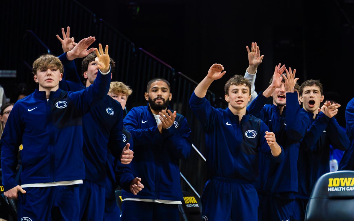 Penn State bench erupts in celebration of takedown by No. 1 Mitchell Mesenbrink during a Big10 top-five wrestling dual between the No. 4 Iowa Hawkeyes and the No. 1 Penn State Nittany Lions at Carver-Hawkeye Arena in Iowa City, Iowa on Friday, Jan. 16, 2026. (Reece Schrader/The Daily Iowan)