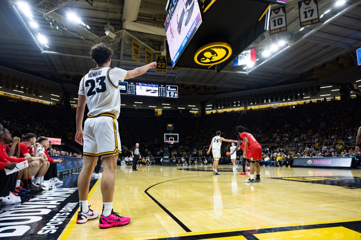 Iowa guard Isaia Howard points during a basketball game between the Iowa Hawkeyes and the Rutgers Scarlet Knights at Carver-Hawkeye Arena on Tuesday, Jan. 20, 2026. Howard had six points. The Hawkeyes defeated the Scarlet Knights 68-62. (Samantha DeFily/The Daily Iowan)