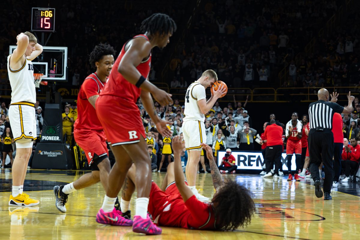 Iowa guard Bennett Stirtz puts his head on the ball after being called for a foul during a basketball game between the Iowa Hawkeyes and the Rutgers Scarlet Knights at Carver-Hawkeye Arena on Tuesday, Jan. 20, 2026. Stirtz had 20 points. The Hawkeyes defeated the Scarlet Knights 68-62. (Samantha DeFily/The Daily Iowan)