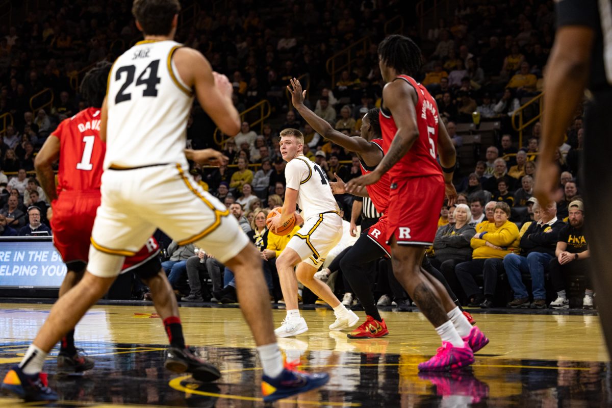 Iowa guard Bennett Stirtz attempts to get past the Rutgers’ defense during a basketball game between the Iowa Hawkeyes and the Rutgers Scarlet Knights at Carver-Hawkeye Arena on Tuesday, Jan. 20, 2026. Stirtz had 20 points. The Hawkeyes defeated the Scarlet Knights 68-62. (Samantha DeFily/The Daily Iowan)